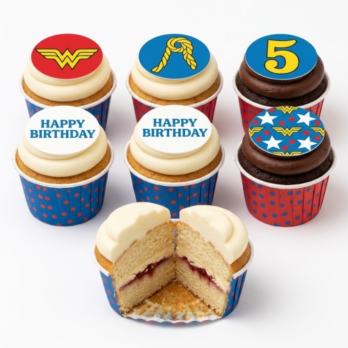 Wonder Woman themed birthday cupcakes with red, blue, and yellow decorations including logo, lasso, stars, "Happy Birthday" message, and a number 5 topper.