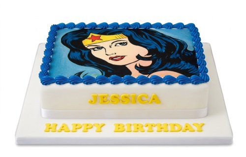 Rectangular Wonder Woman themed birthday cake with blue piped icing and custom name and message.