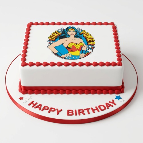White square Wonder Woman 'Girl Power' birthday cake with red heart borders and 'Happy Birthday' message.