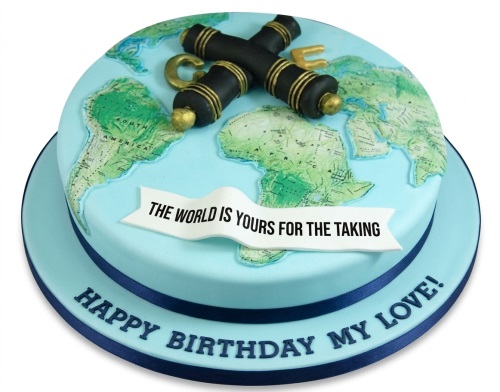 Two-tier light blue world map birthday cake with black and gold telescopes and a custom message banner.