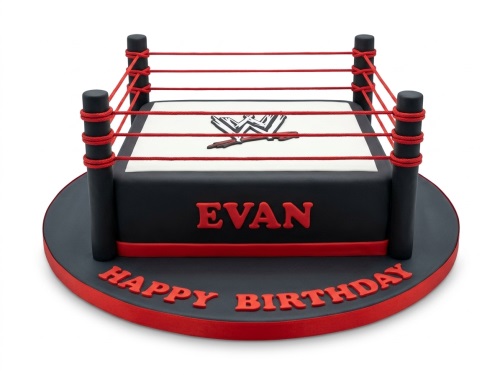 Black and white wrestling ring cake with red ropes and WWE logo, on a round cake board.