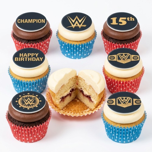WWE themed cupcakes with logo, championship belt, 'Champion', and 'Happy Birthday' toppers. Some with custom age.