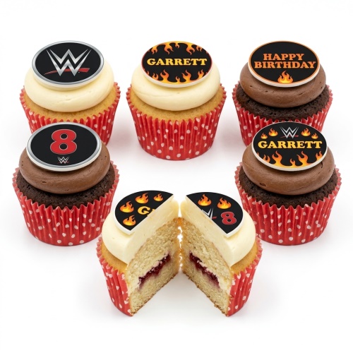 Set of WWE themed cupcakes with white and chocolate frosting, red polka dot cases, and edible toppers featuring WWE logo, flames, custom name, and custom age.