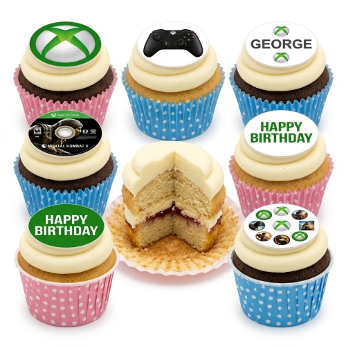 Cupcakes with white frosting and Xbox themed edible toppers including logo, controller, and game covers.