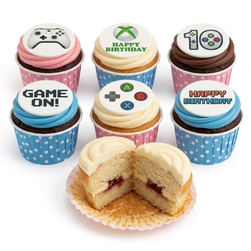Cupcakes with white fondant toppers featuring Xbox controller, Xbox logo, "GAME ON!" and "HAPPY BIRTHDAY" messages, and a custom age topper.