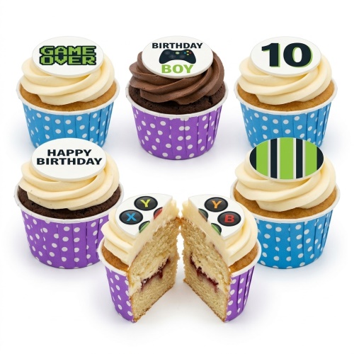A set of gaming-themed cupcakes with white and chocolate frosting, featuring game controller and 'Game Over' toppers, and a custom age number.