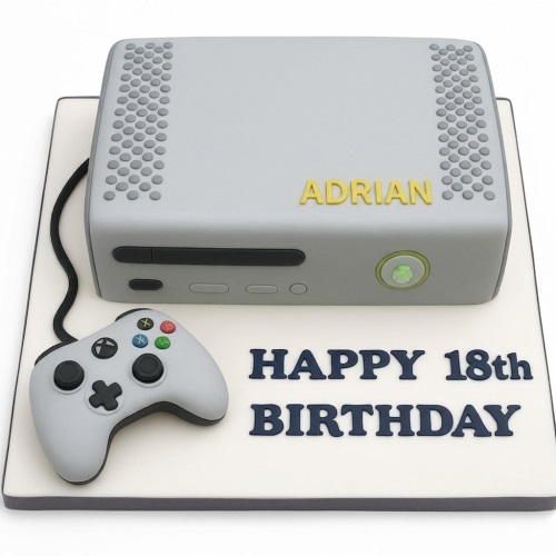 3D Xbox gaming console birthday cake with controller and custom age message.
