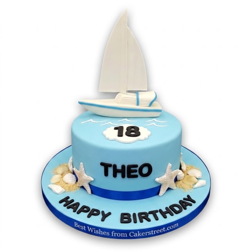 Light blue single-tier birthday cake with a white sailboat topper, custom age, name, starfish, and seashells.