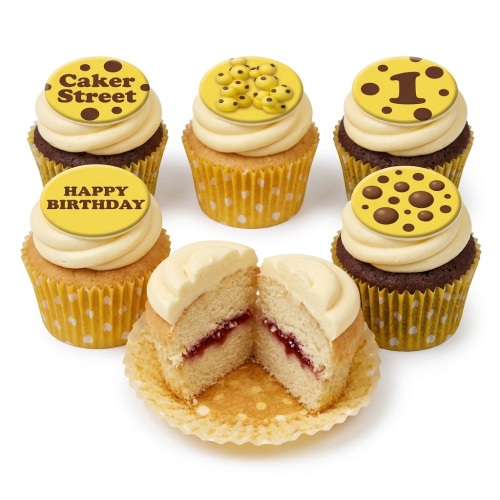 Assortment of birthday cupcakes with custom age topper, 'Happy Birthday' message, and cookie designs
