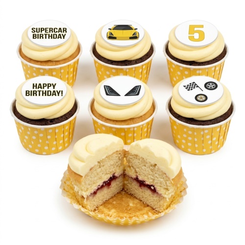 Set of six supercar themed birthday cupcakes with yellow and white polka dot cases, featuring car, racing flag, and 'SUPERCAR BIRTHDAY' toppers.