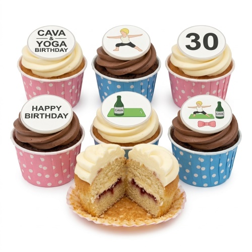 Six cupcakes with yoga and Cava toppers, some with vanilla and chocolate frosting. One cupcake is cut to show jam filling.
