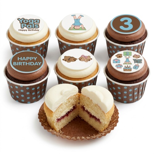 Set of Yoga Pals themed birthday cupcakes with vanilla and chocolate frosting, polka dot cases, and custom age topper.