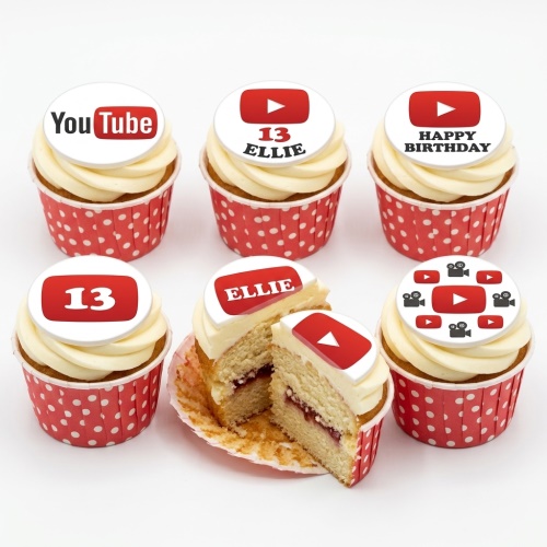 Set of six vanilla cupcakes with white frosting and red polka dot wrappers, topped with edible YouTube theme decorations and custom age/message examples.