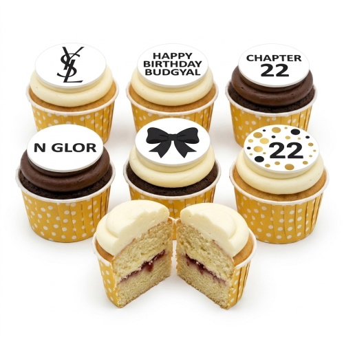 Set of designer-inspired birthday cupcakes with YSL logo, black bow, custom age, and personalised message toppers.